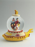 Figurines of the Beatles Band in a Snow Globe