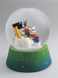 Close-Up of a Snowman and a Mouse in a Snow Globe