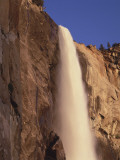 View of Bridal Veil Falls Illuminated by the Light of Sunset