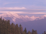 One May View Mountains by Looking East to their Snow-Covered Slopes