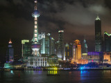 China, Shanghai, Night View of High Rises and Oriental Pearl TV Tower by Huangpu River