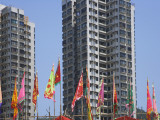 China, Hong Kong, Temple Flags with Modern High Rises