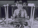Buy Boy Sits Dow to Thanksgiving Dinner at AllPosters.com