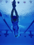 Female Swimmer Diving into Pool, Underwater View