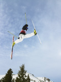 Skier Doing Freestyle Jump in Air Photographic Print