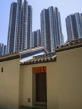 China, Hong Kong, Traditional Kejia People's House with Modern High Rise