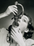 Buy Woman Swallows Sword Up to Hilt, 1940S at AllPosters.com