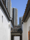 China, Hong Kong, Traditional Kejia People's House with Modern High Rise