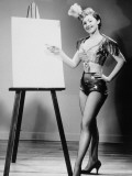 Buy Showgirl Pointing to Piece of Blank Board, 1960S at AllPosters.com