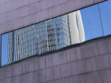 China, Hong Kong, Reflection of Ifc2 Building on the Window of a Building