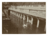 Colonnade and No Water in a Park in Nimes with Swan