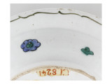 Dish with a Scrollwork Medallion Furnished to Florets