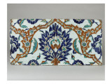 Two Tiles Decorated with Polychrome Stylized Plant
