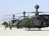 Buy Oh-58D Kiowa Warrior Helicopters Parked at Camp Speicher, Iraq at AllPosters.com