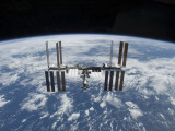 Buy The International Space Station in Orbit Above the Earth at AllPosters.com