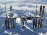 Buy International Space Station in Orbit Above the Earth at AllPosters.com