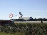 Buy Space Shuttle Atlantis Unfurls its Drag Chute Upon Landing at Kennedy Space Center, Florida at AllPosters.com