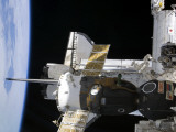 Buy A Docked Soyuz Spacecraft over the Docked Space Shuttle Atlantis at AllPosters.com