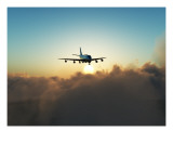 Buy A Plane In Flight Over Clouds at AllPosters.com