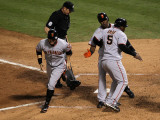 Texas Rangers v. San Francisco Giants, Game 5:  (L-R) Cody Ross, Edgar Renteria and Juan Uribe
