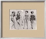 Models Sunbathing, Wearing Latest Beach Fashions