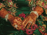 A Bride's Hands Respendent with Jewels and Decorated with Henna