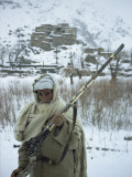 Man in Wool Scarf and Coat Poses with East India Company Rifle