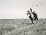 Buy Whirling His Boleadoras, a Man Charges after an Ostrich at AllPosters.com