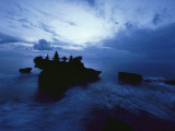 Tanah Lot Temple Stands Perched Atop a Rock in the Indian Ocean