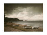 Buy As a Storm Approaches, Empty Rowboats Lay on the Shore at AllPosters.com