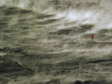 Buy Man Standing in Steaming Rain Falling on Still-Hot Volcanic Lava at AllPosters.com
