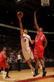 Houston Rockets v Toronto Raptors: Jose Calderon and Chuck Hayes