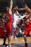 New Jersey Nets v Sacramento Kings: Tyreke Evans, Brook Lopez and Kris Humphries