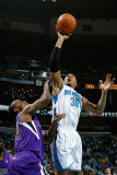 Sacramento Kings v New Orleans Hornets: David West and Carl Landry