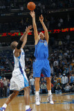 Dallas Mavericks v New Orleans Hornets: Dirk Nowitzki and David West