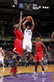 Chicago Bulls v Sacramento Kings: Carl Landry and Luol Deng