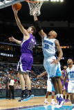 Sacramento Kings v New Orleans Hornets: Beno Udrih and David West