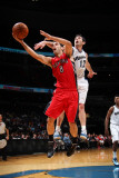 Toronto Raptors v Washington Wizards: Jose Calderon and Kirk Hinrich