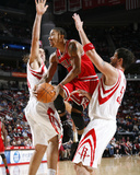 Chicago Bulls v Houston Rockets: Derrick Rose, Brad Miller and Luis Scola