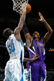 Sacramento Kings v New Orleans Hornets: Jason Thompson and Emeka Okafor