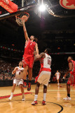 Houston Rockets v Toronto Raptors: Luis Scola and Amir Johnson