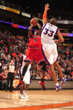 Buy Chicago Bulls v Phoenix Suns: Luol Deng and Grant Hill at AllPosters.com