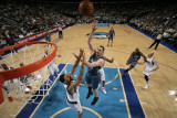Minnesota Timberwolves v Dallas Mavericks: Kevin Love and Tyson Chandler