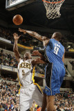 Orlando Magic v Indiana Pacers: T. J. Ford and Rashard Lewis