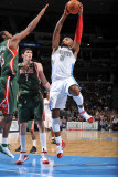 Milwaukee Bucks v Denver Nuggets: J.R. Smith, John Salmons and Ersan Ilyasova