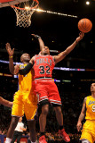Chicago Bulls v Los Angeles Lakers: C.J. Watson and Lamar Odom