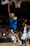 Dallas Mavericks v New Orleans Hornets: Dirk Nowitzki and Trevor Ariza
