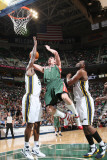 Milwaukee Bucks v Utah Jazz: Ersan Ilyasova, Al Jefferson and C.J. Miles