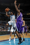 Sacramento Kings v New Orleans Hornets: Chris Paul and Carl Landry
