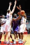 Dakota Wizards v Iowa Energy: Darren Cooper, Connor Atchley and Othyus Jeffers